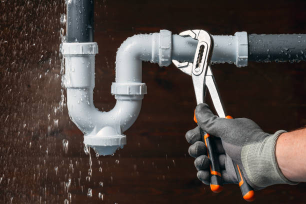 Professional Emergency Plumber technician working in Newton, MA